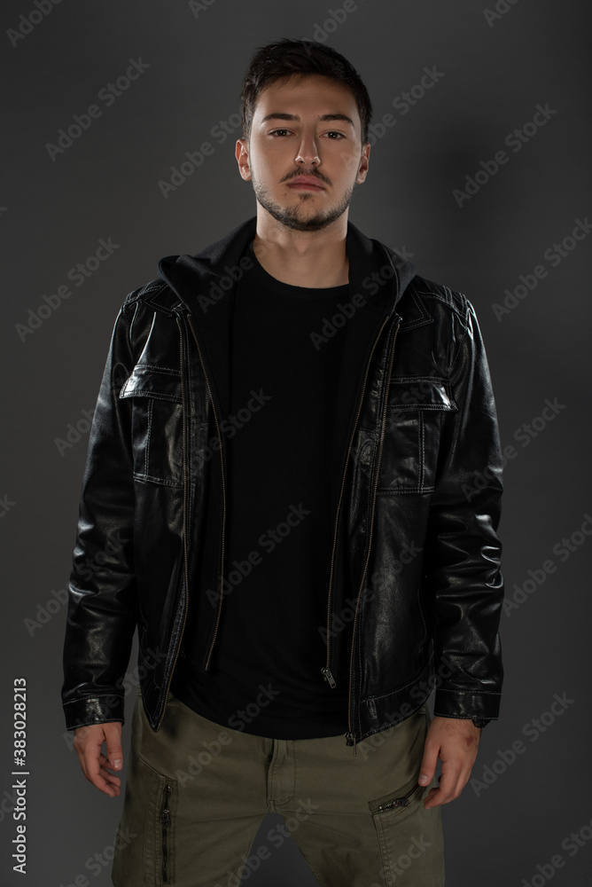 Portrait of an actor boy posing in studio on grey background. Isolated Portrait of an actor boy posing in studio on grey background. Isolated