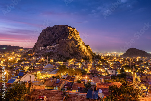 Afyonkarahisar city cityscape with Afyon castle on the rock, Turkey photo