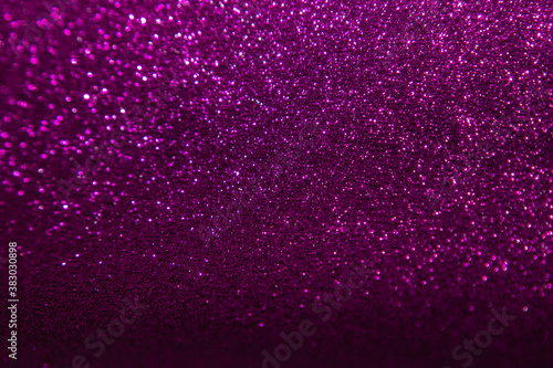 blured purple glitter texture abstract background