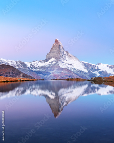 Wallpaper Mural Picturesque landscape with colorful sunrise on Stellisee lake. Snowy Matterhorn Cervino peak with reflection in clear water. Zermatt, Swiss Alps Torontodigital.ca