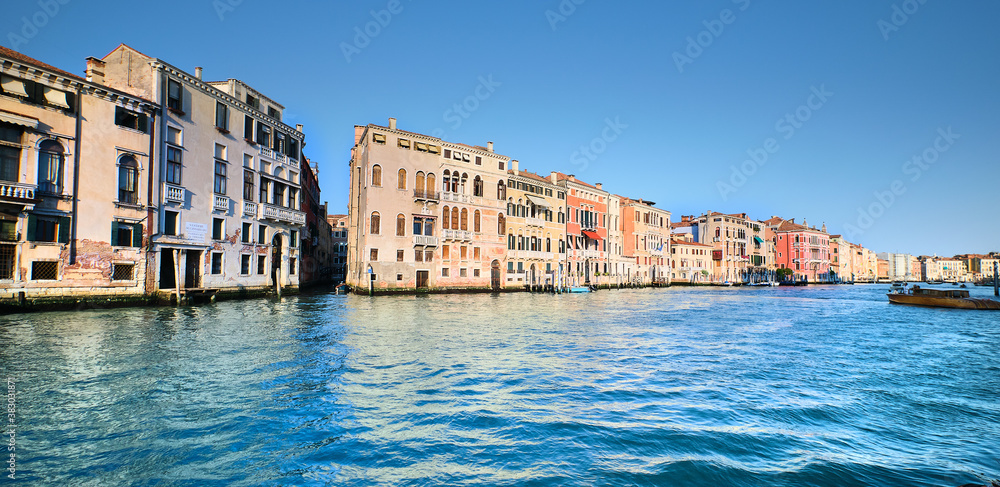 Traditional architecture on Grand Canal in Venice, Italy. Old houses and canals used as streets.