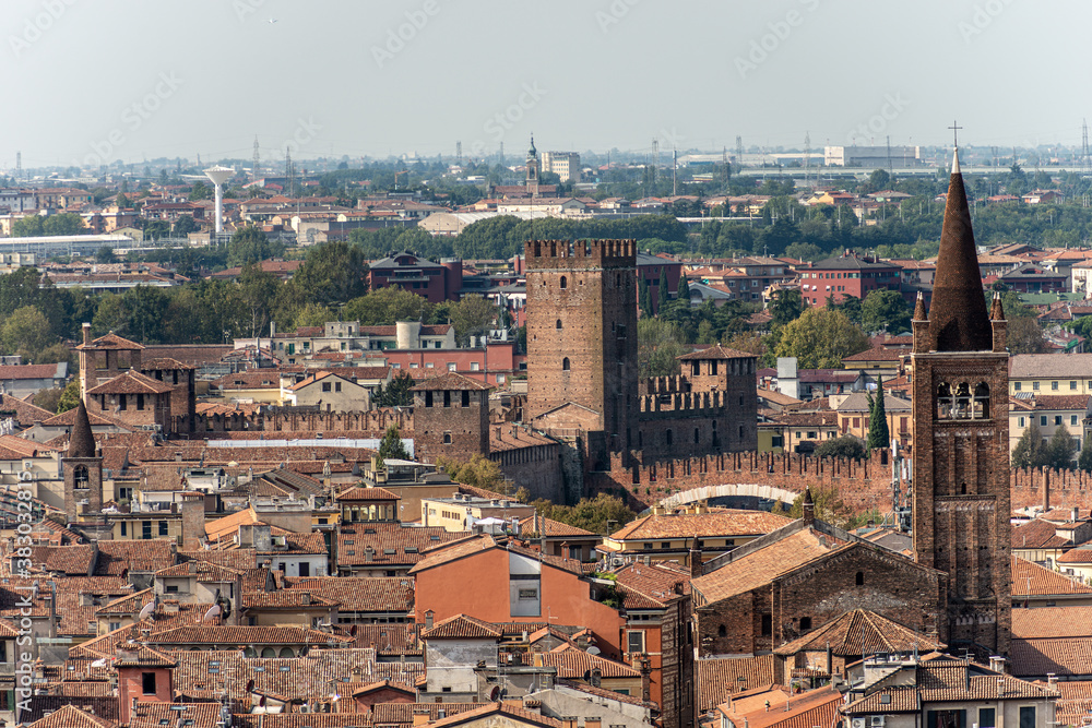 Verona cityscape seen from the hill, historic district with the church of Santa Eufemia and Castelvecchio (Old Castle). UNESCO world heritage site. Veneto, Italy, Europe.