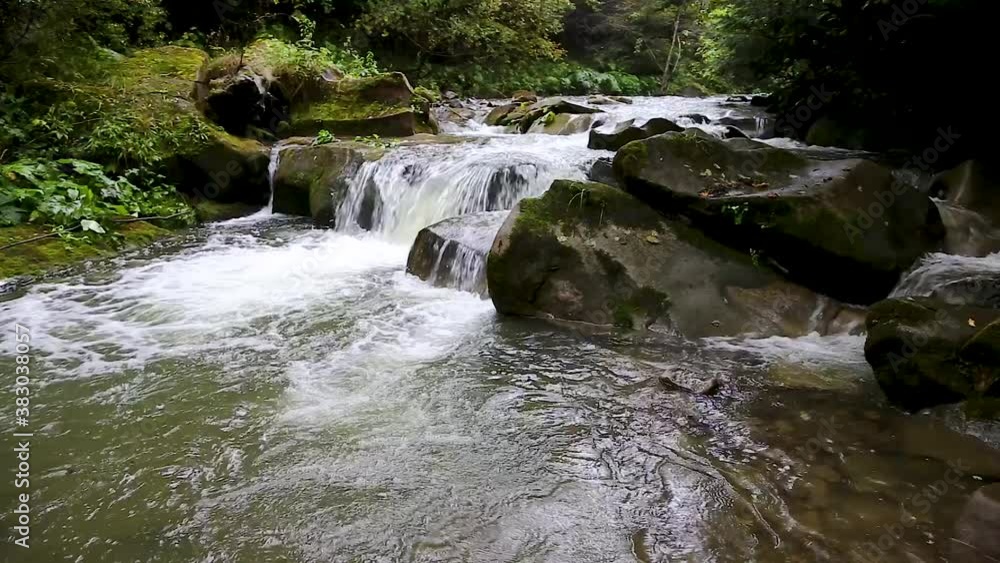 Wonderful waterfall on the mountain river Carpathians. Waterfall, fast mountain water, National Park of Skole Beskydy, Ukraine. Carpathian river, fast current, crystal water. Long exposure shot.
Wonderful waterfall on the mountain river Carpathians. Waterfall, fast mountain water, National Park of Skole Beskydy, Ukraine. Carpathian river, fast current, crystal water. Long exposure shot.