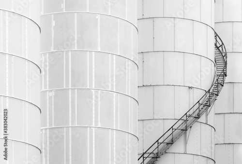 Staircase on oil tank in chemical factory. Industrial background