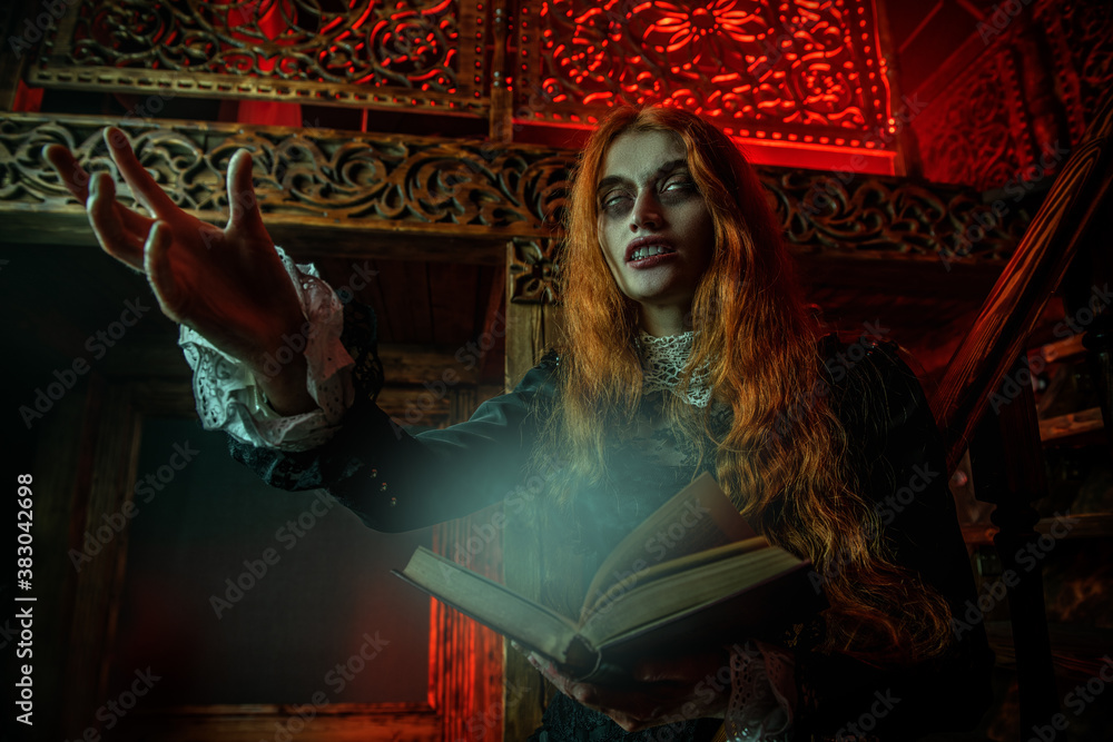 redhead witch with magic book redhead witch with magic book