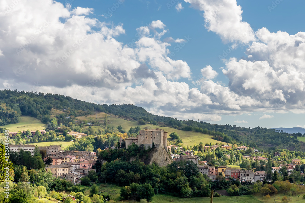 Superb panoramic view of the historic center of Sant'Agata Feltria, Emilia Romagna, Italy, against a dramatic sky