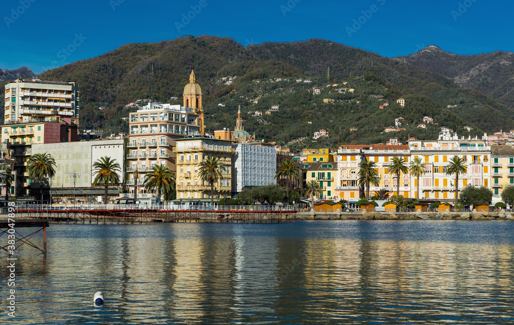 Rapal View from sea of seafront of Italian town of Rapallo with belltower and ...