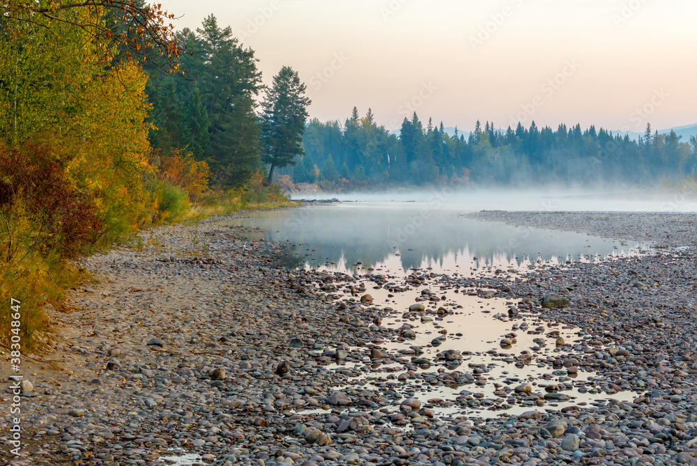 early foggy morning Autumn scene on the flathead river, Montana