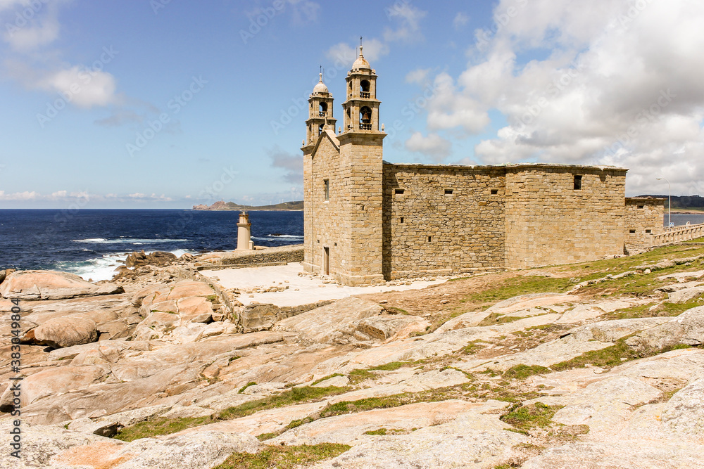Muxia, Spain. The Punta da Barca, with the lighthouse and the shrine of Nuestra Senora de la Barca (Our lady of the Boat)