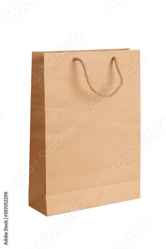 Brown recycled paper bag on white background. Mockup with copy space for text.