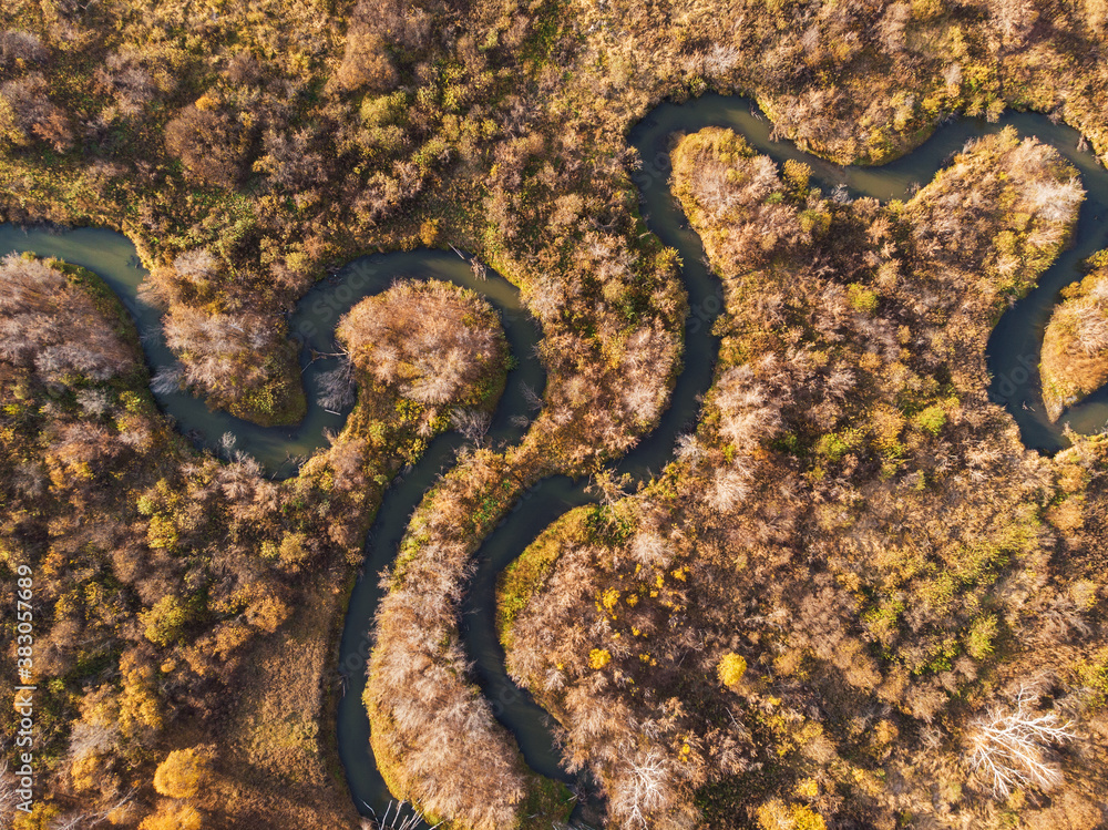 Aerial drone view of autumn landscape with river. Aerial drone view of autumn landscape with river.