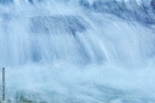 natural background - the jets of the waterfall are blurred in motion