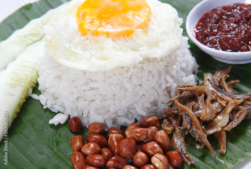 Nasi lemak is a Malay fragrant rice dish cooked in coconut milk and pandan leaf. It is commonly found in Malaysia, where it is considered the national dish.
