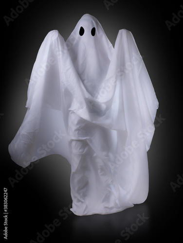Scary white ghost at big eye for Halloween concept with clipping part