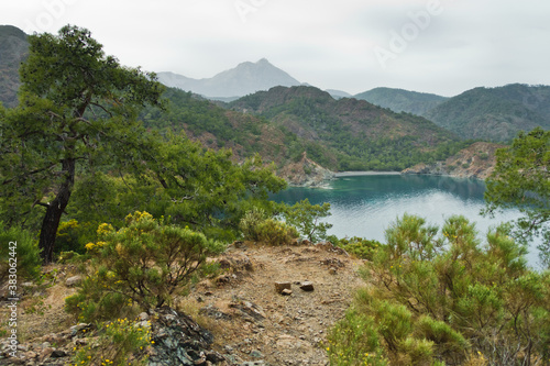 Landscape and seascape views on a coastal path leading from Cirali beach to Tekirova in Turkey