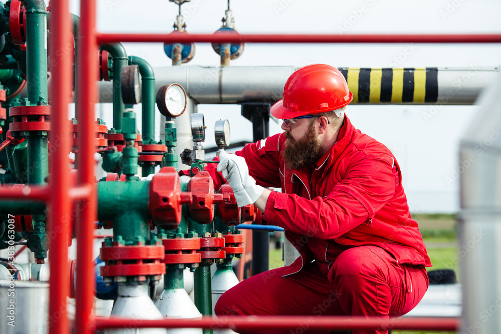 Technician in oil and gas refinery. Worker in Oil Refinery. Technician in oil and gas refinery. Worker in Oil Refinery.