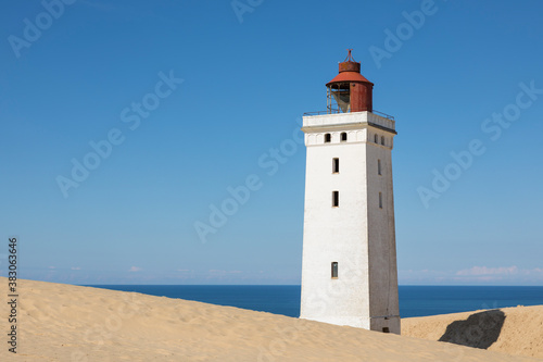 Rubjerk Knude Fyr, famous lighthouse in the North Sea dunes of Denmark © eyewave