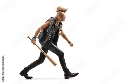 Fényképezés Angry punk rocker with a mohawk running with a baseball bat