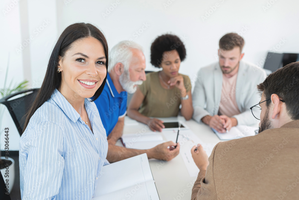 Business people discussing work at office meeting Business people discussing work at office meeting