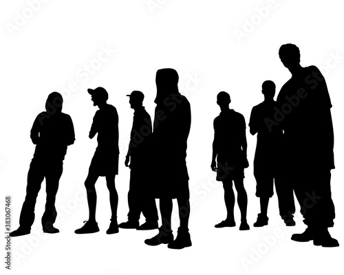 Young people in fashionable clothes on the street. Isolated silhouettes on white background