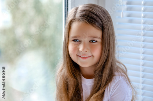 portrait of a little girl 4-5 years old smiling. Free Download portrait of a little girl 4-5 years old smiling. - GFXLoad