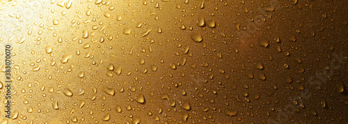 yellow water drops on glass