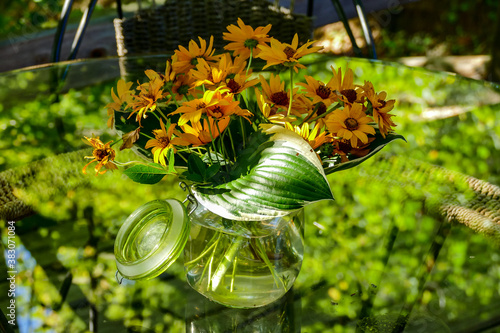 flowers in a vase, digital photo picture as a background , taken in bled lake area, slovenia, europe photo