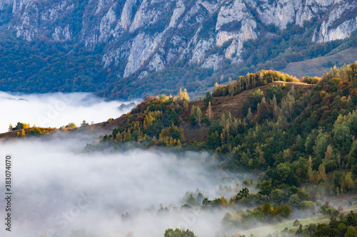 rural Romania beautiful foggy morning landscape in Apuseni mountains