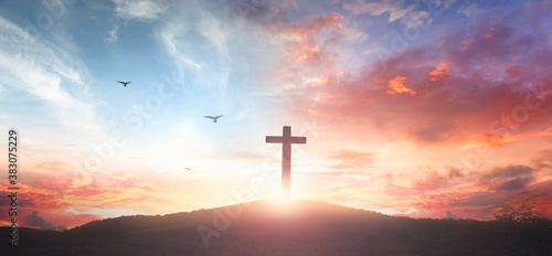 Stampa su tela Christian wooden cross on the mountain  sunset background