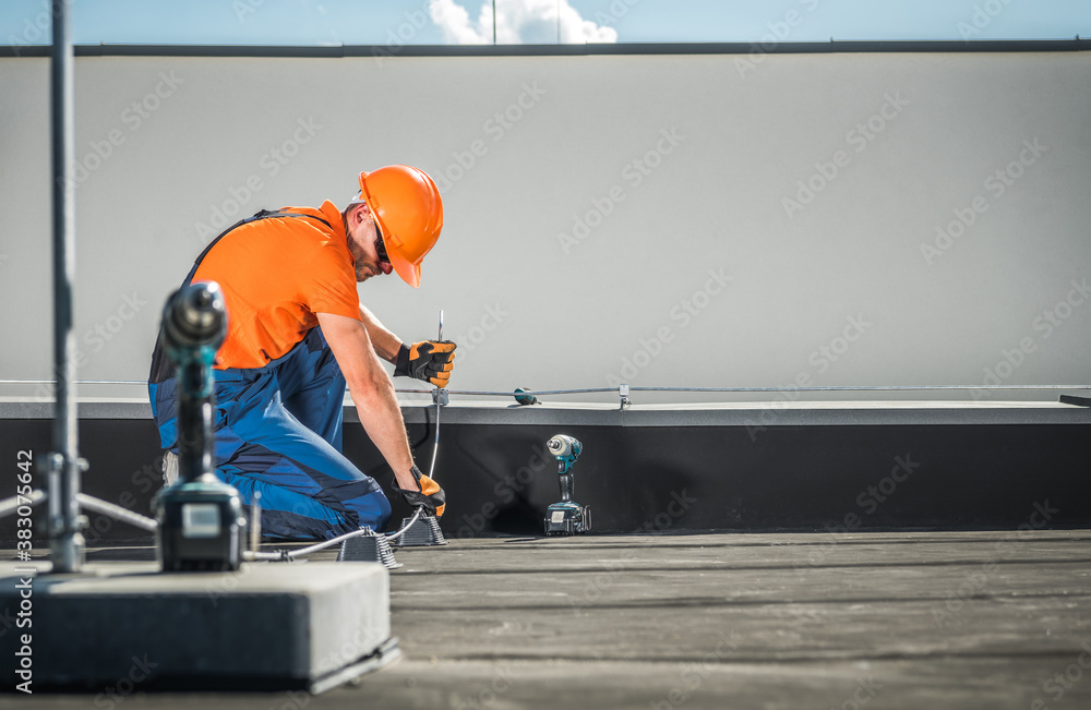 Residential Building Lightning Protection System Installer Stock Photo