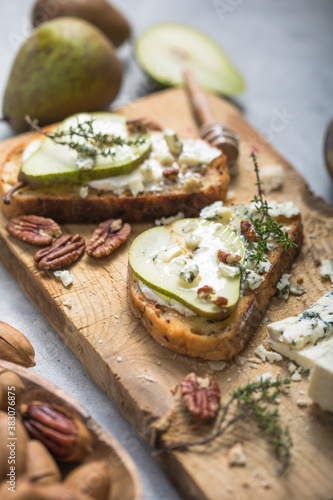 Pear, blue cheese, thyme sandwiches - delicious breakfast, snack, top view