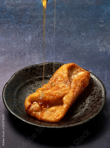 Pestiños, Spanish honey-coated fritters. A traditional Nasrid sweet typical at Christmas and Easter time. photo