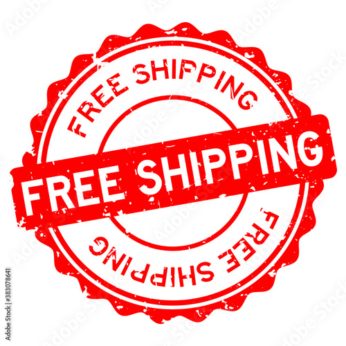 Grunge red free shipping word round rubber seal stamp on white background