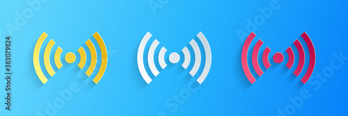 Paper cut Wi-Fi wireless internet network symbol icon isolated on blue background. Paper art style. Vector.