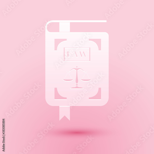 Paper cut Law book statute book with scales of justice icon isolated on pink background. Paper art style. Vector.