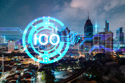 Photography Initial coin offering hologram, night panorama city view of Kuala Lumpur