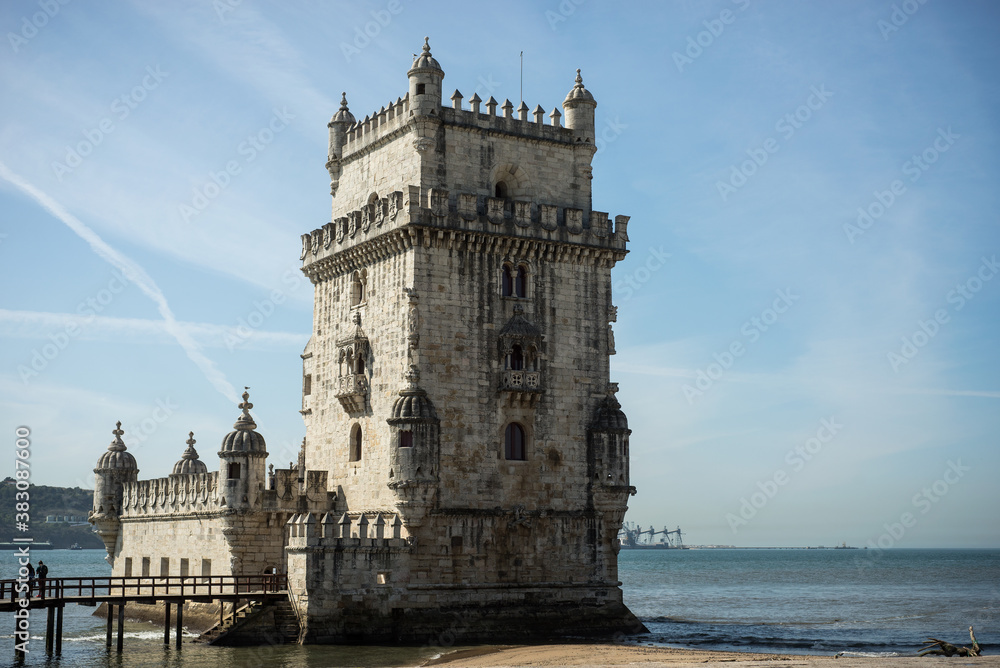 View of the medieval Belem tower in border river at Lisbon Portugal