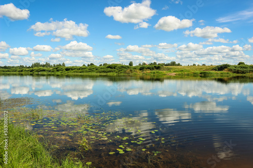 Fototapeta Naklejka Na Ścianę i Meble -  Beautiful Landscape with reflection on River Sky and Clouds.