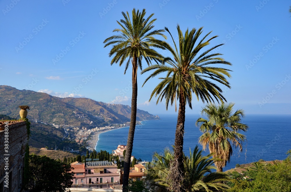 View from Taormina cable car station towards the Bay of Spinsone, mediterranean sea