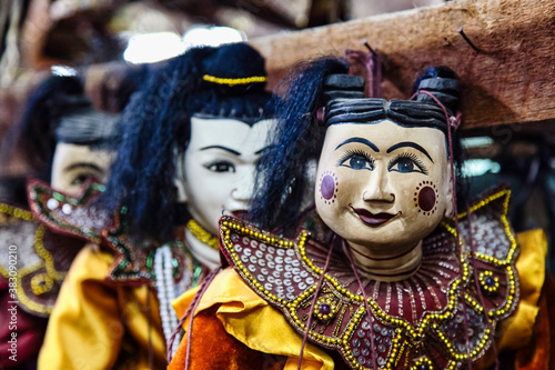 Traditional handicraft puppets are sold in a market at Mandalay, Myanmar.