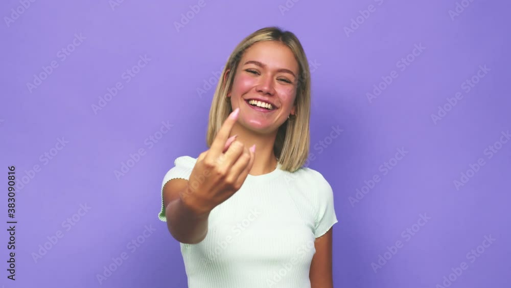Young blonde caucasian woman excited keeping ok gesture on eye Young blonde caucasian woman excited keeping ok gesture on eye