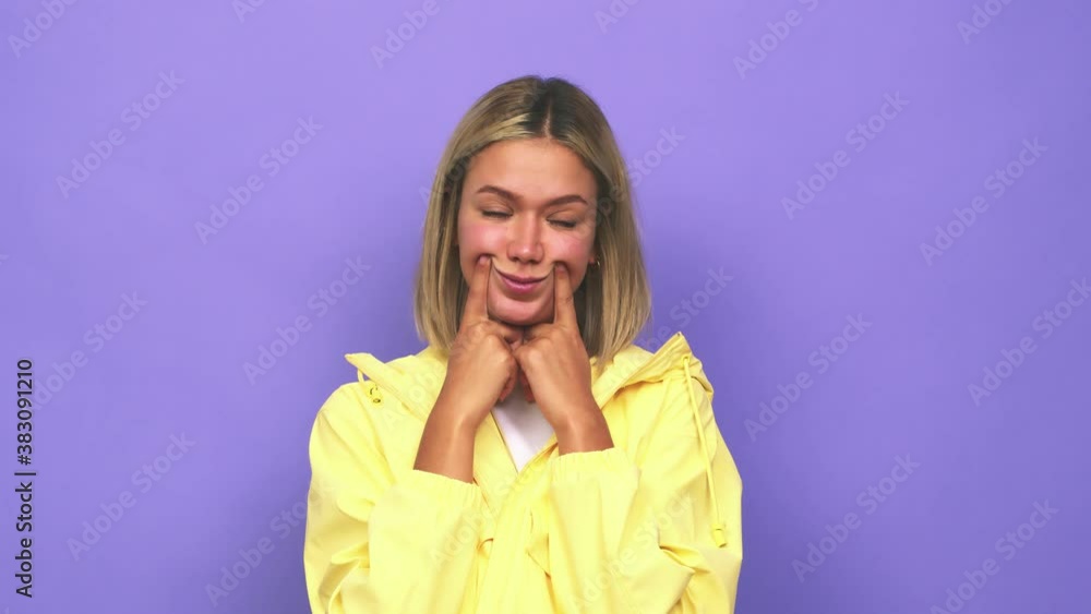 Young blonde caucasian woman doubting between two options Young blonde caucasian woman doubting between two options