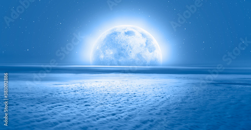 Night sky with moon in the clouds  Elements of this image furnished by NASA