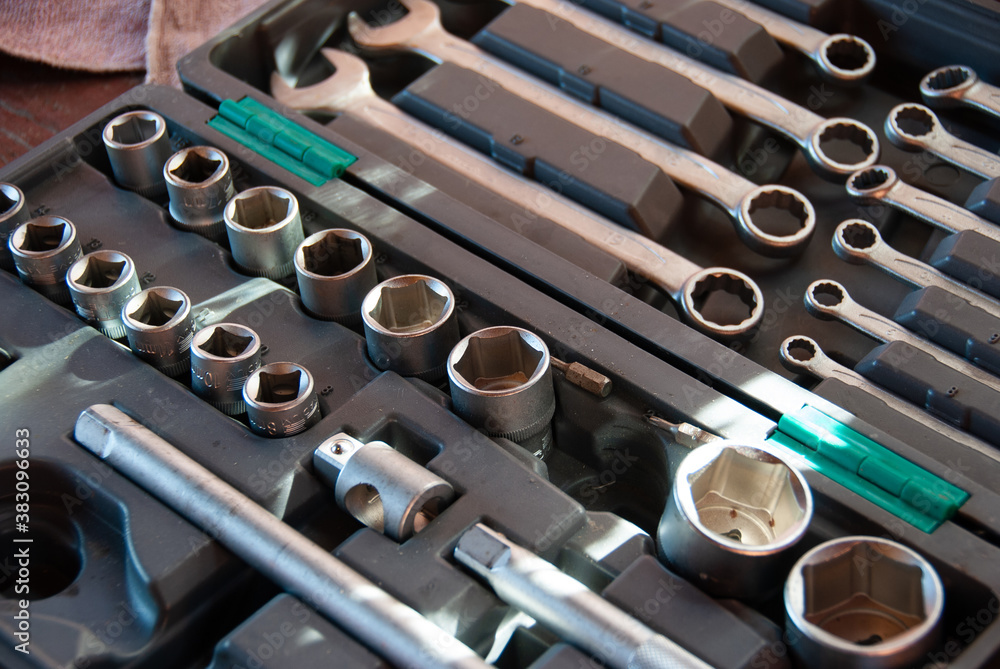 Naklejka premium A set of metal tools in a case