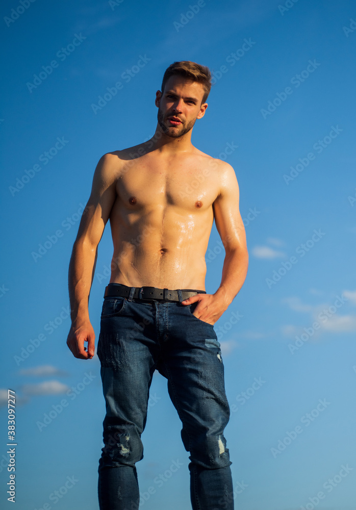 Fototapeta premium Be strong. naked strong man. muscular strong man has wet body. athletic body shape. shirtless guy relax at sunrise. young athletic guy with muscular body. sportsman and fitness model