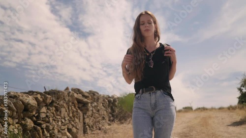 Travelling of a pretty girl walking and enjoying the environment