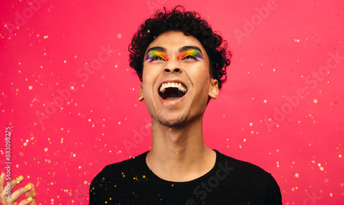 Fotografie, Obraz Excited gay man with glitters