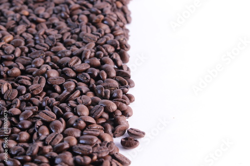 Dark coffee beans isolated background