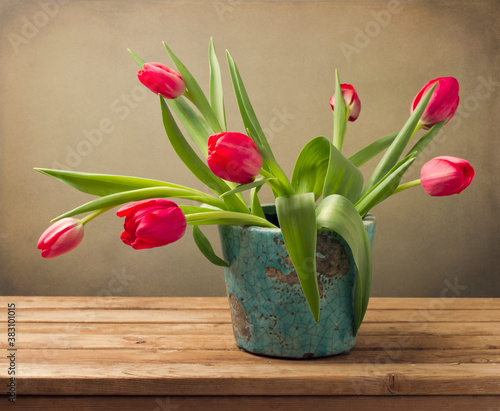 Still life with red tulip flower bouquet