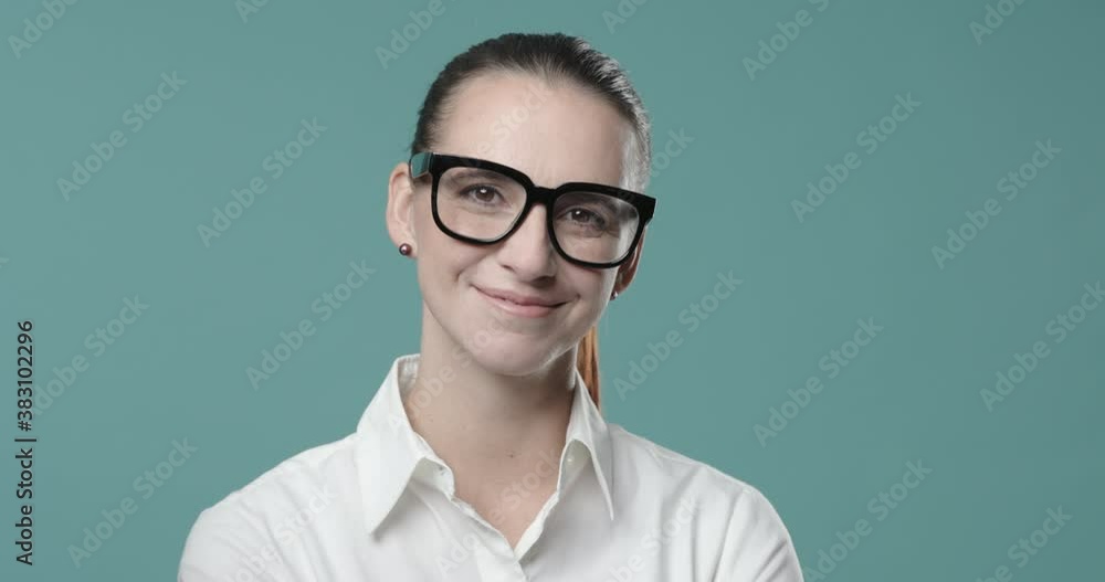 Smiling young businesswoman with glasses Smiling young businesswoman with glasses